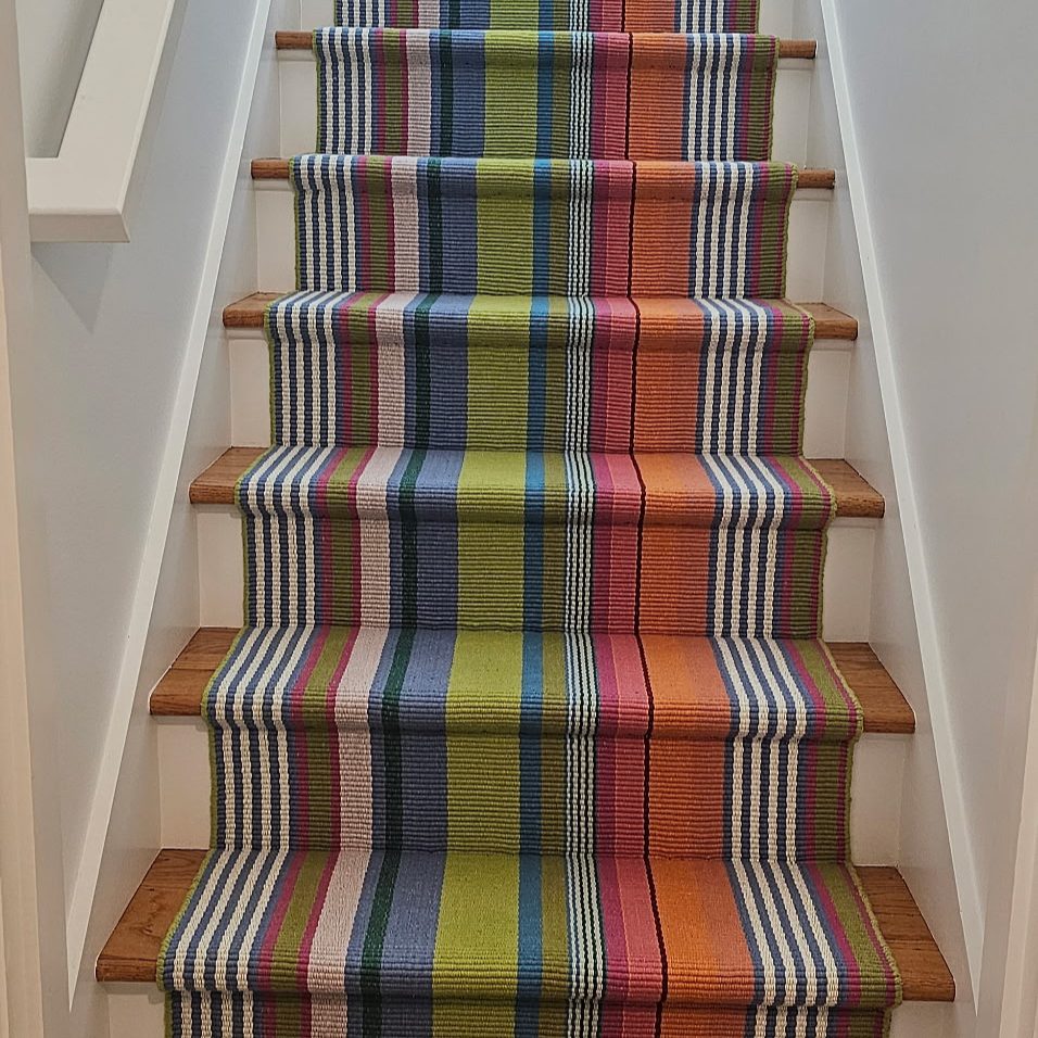 Striped, colorful stair runner installation in Illinois